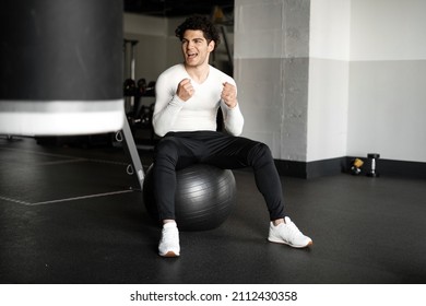 A Man Healthy Lifestyle Athlete Does The Right Exercises Cardio Workout In The Gym. Fitness Concept