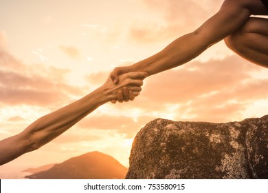 Man Helping Woman Up Mountain Path. Teamwork, Risk, Friendship, Challenge Concept. 