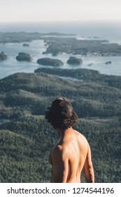 Man Heroic Pose On Top On Mountain With Beautiful Island Landscape