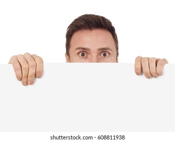 Man Hiding Behind A Blank Sign