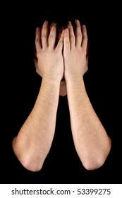 Man Hiding His Face On Black Background