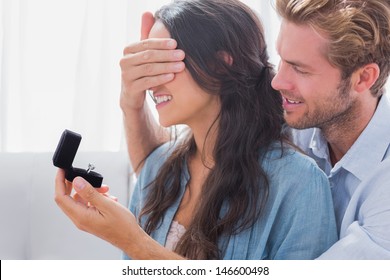 Man Hiding His Wifes Eyes To Offer Her An Engagement Ring For A Marriage Proposal