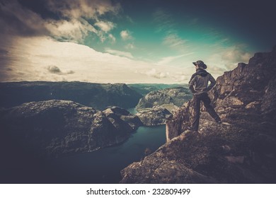 Man Hiker Looking Over Fjord Panorama