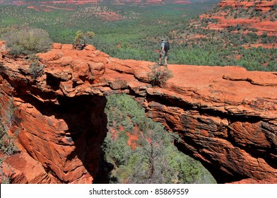 Man Hiking At Devils Bridge In Sedona Arizona