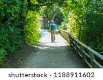 A man hiking down the Niagara Gorge Trail in New York