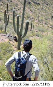 Man Hiking In Tucson Desert In Tucson, Arizona On April 11, 2019.