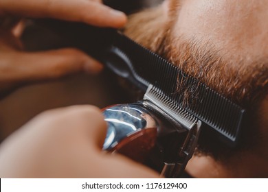 Man Hipster Having Barber Shave Barbershop Hair Machine.