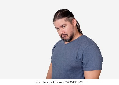 A Man In His 30s With Hurt Feelings Sulking. Let Down By Someone Or Feeling Sorry. Looking A Bit Funny. Isolated On A White Background.