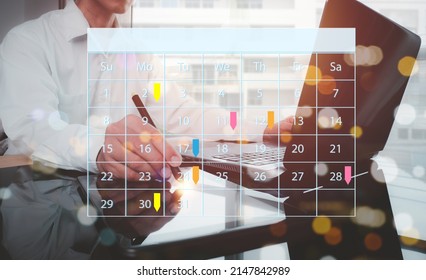 A Man His Right Hand Drew A Pencil On A Digital Tablet That Displayed Appointment Reminder For The Calendar And The Organizer's Agenda. Timetables Are Used By Event Planners To Schedule Activities.