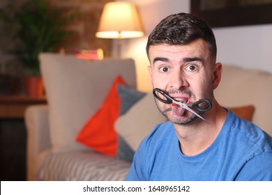 
Man His Scissors Stabbed In Tongue 
