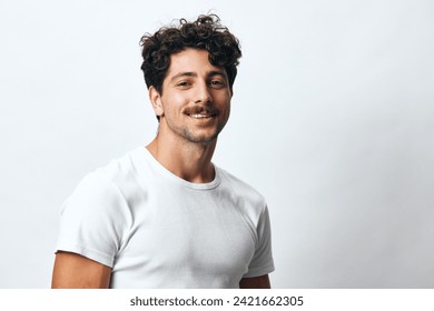 Man hispanic isolated portrait student white smile arms lifestyle fashion serious background t-shirt hipster - Powered by Shutterstock