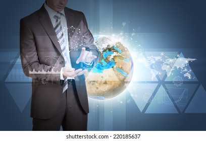 Man hold empty copy space. Earth with graphs and network as backdrop. Elements of this image are furnished by NASA