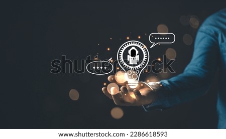 man hold lightblub icon and command prompt chatgpt. Big data storage.Digital Artificial Intelligence (AI) technology disruption concept. We are implementing storage technology support in the business.