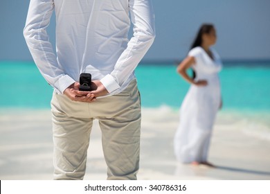 Man hold marriage ring  - Shutterstock ID 340786316