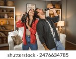 man hold microphone and sing, woman hold loudspeaker karaoke party