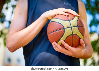 man holding a basketball