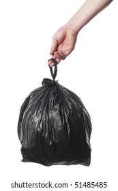 Man Holding Black Plastic Trash Bag In His Hand