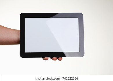 Man Holding Black Tablet Frame In Hand