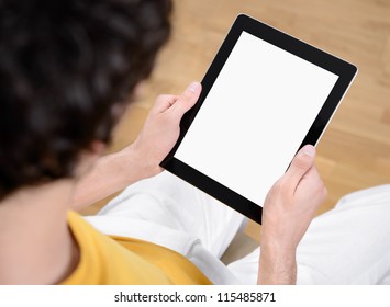 Man Holding Blank Digital Tablet Computer In Hands.