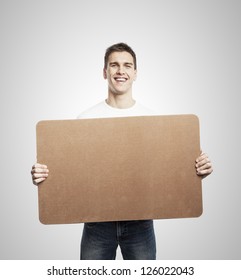 Man Holding Blank Poster On A White Background