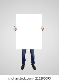 Man Holding Blank Poster On White Background