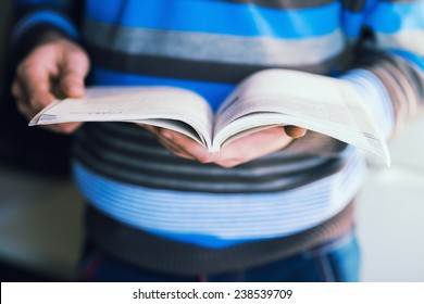Man Holding   Book