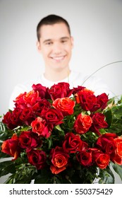 Man Holding Bouquet Of Roses