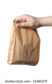 Man Holding A Brown Paper Bag With Contents In His Hand.