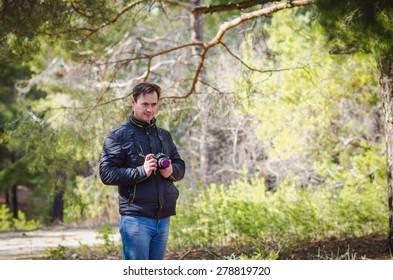 A man holding a camera