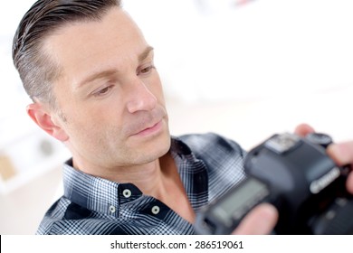 Man holding camera