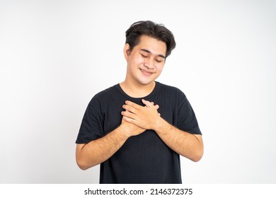 Man Holding Chest And Looking Up Comfortable