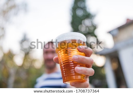 Similar – Image, Stock Photo Glass of beer at sunset at Steinhuder Meer