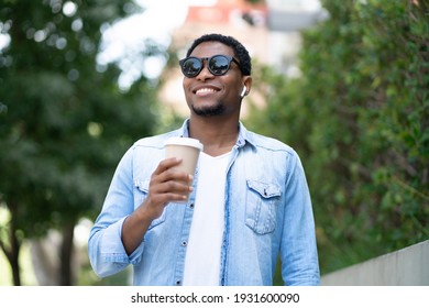 Man holding a cup of coffee.