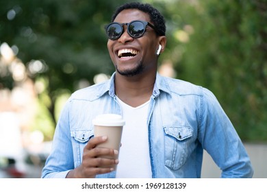 Man Holding A Cup Of Coffee.