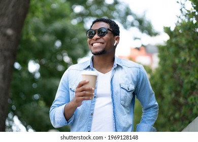 Man Holding A Cup Of Coffee.