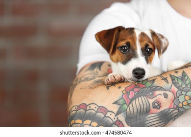 Man holding cute dog