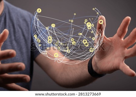 Man Holding a Digital Network Sphere Represents Connection