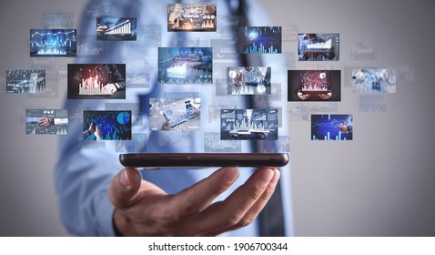 Man holding a digital pictures of business graphs. Business. Technology