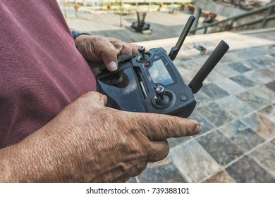 Man Holding Drone Remote Control.