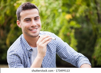Man holding an electronic cigarette