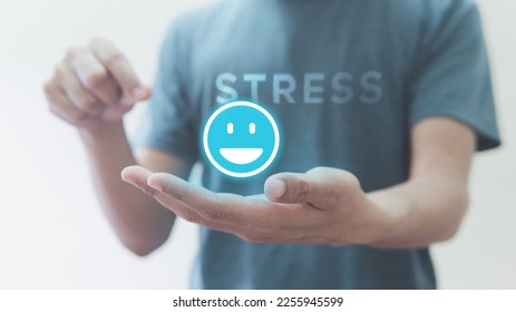 Man Holding of emotion happy blue icon virtual screen interface, stress meter, medical technology and business concept.
