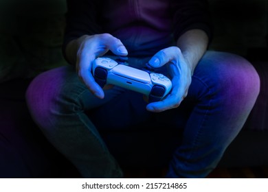 Man holding a game controller.