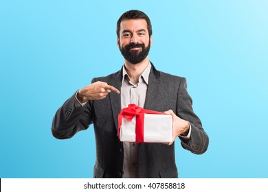 Man Holding A Gift