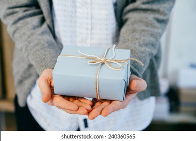 Man Holding A Gift Box