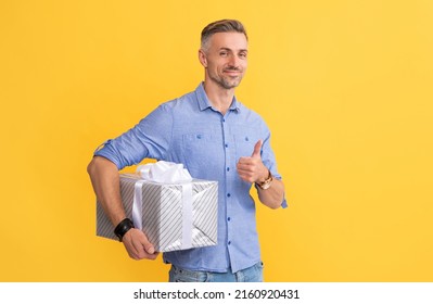 man holding giftbox. handsome man prepare for romance date.