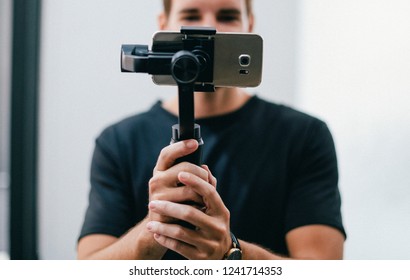 Man Holding A Gimbal With A Phone