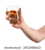 Man holding glass of whiskey with ice cubes on white background, closeup