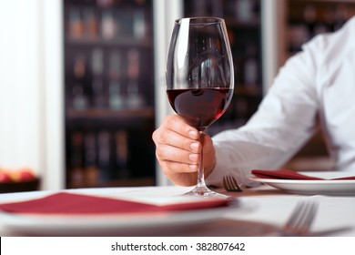 Man Holding Glass Of Wine 