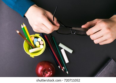 Man Holding Glasses In Hands, Book, School Supplies, School, Teacher.