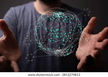 Man holding a glowing data network sphere, connection concept